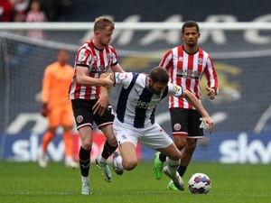 Tommy Doyle during his loan spell with Sheffield United last season (Photo by Adam Fradgley/West Bromwich Albion FC via Getty Images).