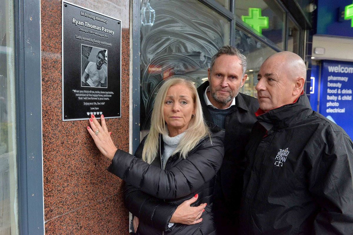 Unveiling the plaque in memory of Ryan Passey are his dad Adrian Passey, mom Gillian Taylor and step-dad Phil Taylor