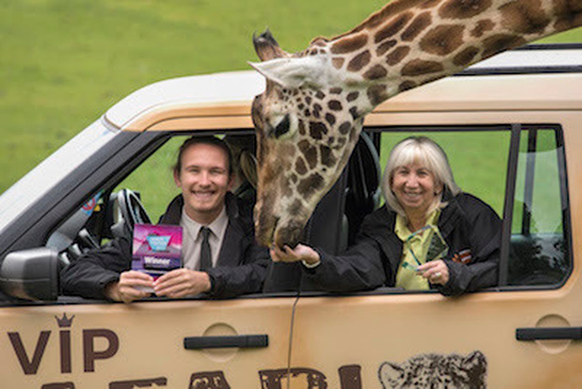 Tom Bache and Sue Day from West Midland Safari Park celebrate being head and shoulders above the rest for group travel.