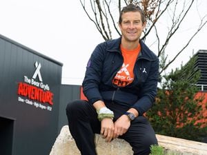 Bear Grylls outside the attraction.