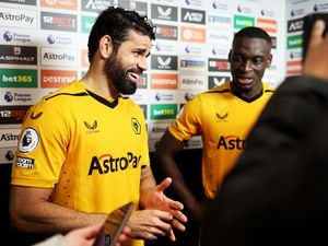 Diego Costa (L) and Toti Gomes (Photo by Jack Thomas - WWFC/Wolves via Getty Images).