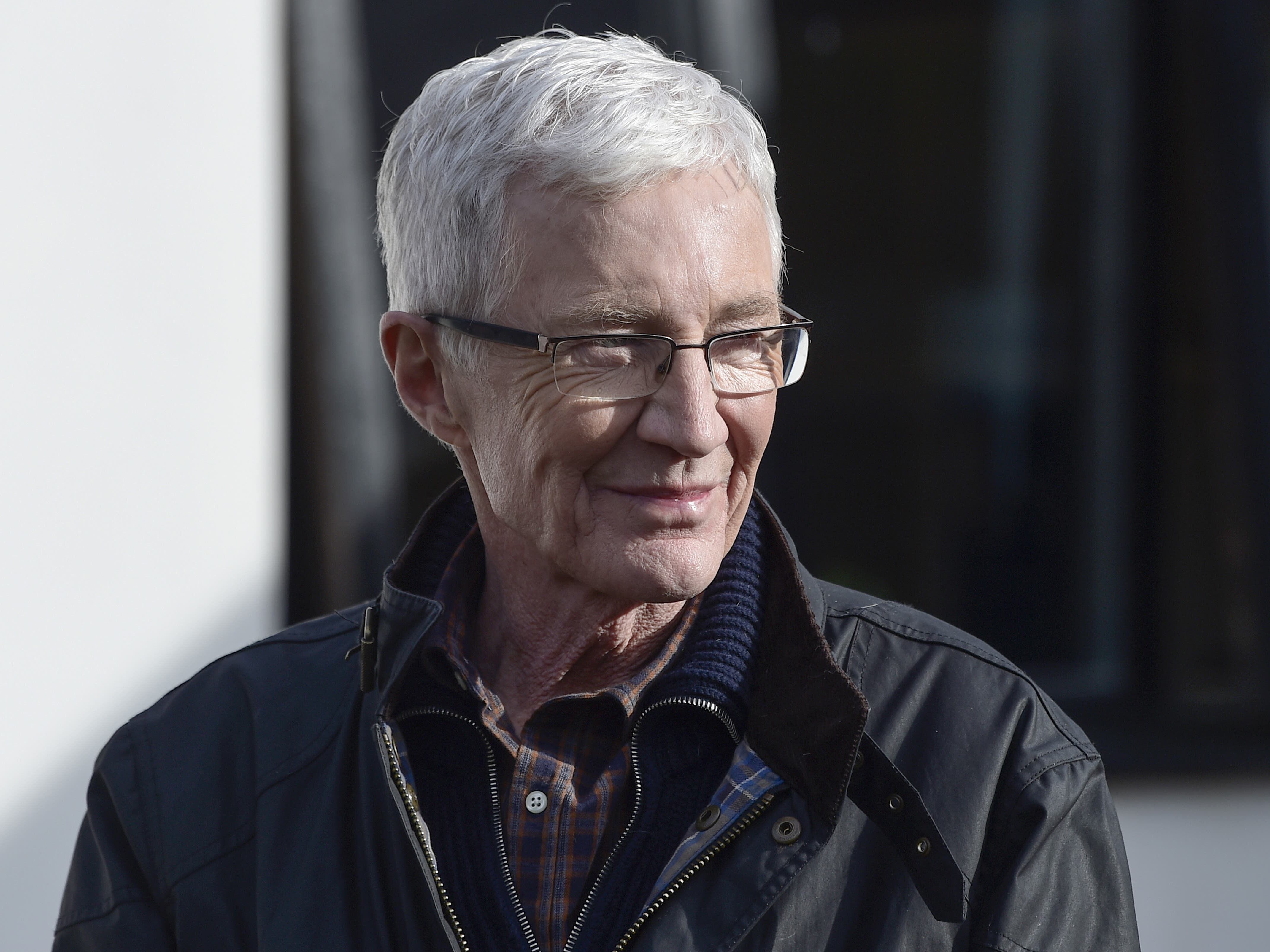 Paul O’Grady’s widower took their dogs for a final goodbye before his burial