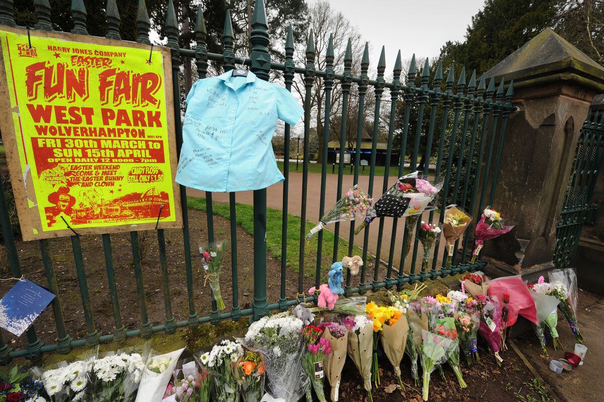 A wall of floral tributes left at West Park