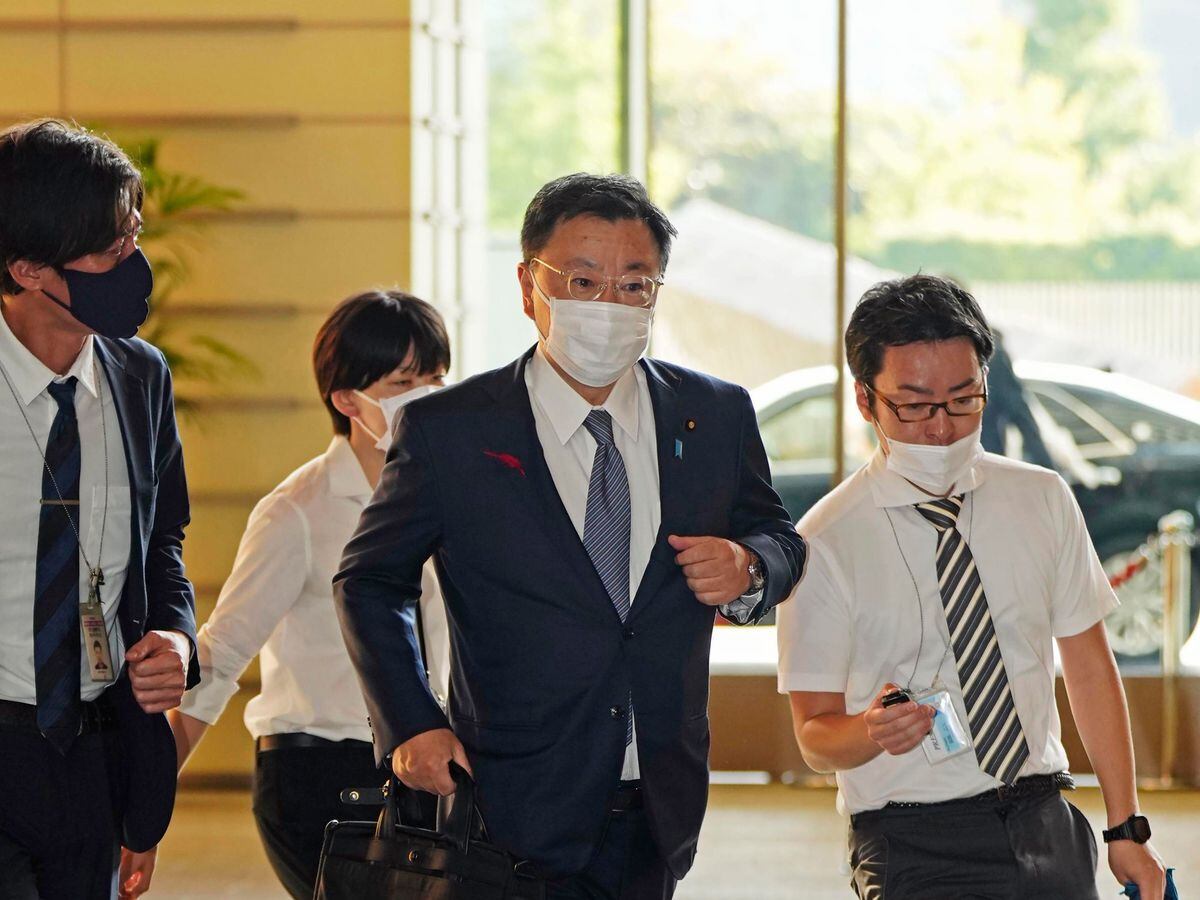 JapanÃ¢ÂÂs Chief Cabinet Secretary Hirokazu Matsuno, center, arrives at the prime ministerÃ¢ÂÂs office in Tokyo Tuesday, Oct. 4, 2022