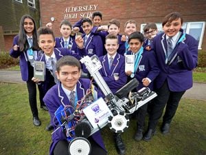 WOLVERHAMPTON COPYRIGHT EXPRESS&STAR TIM THURSFIELD- 05/02/20.Pupils from Aldersley High School, Wolverhampton, celebrate getting through to the nationals of a robot challenge which took part at RAF Cosford. Pictured is Ryan Taylor, aged 13,(front) with team mates..