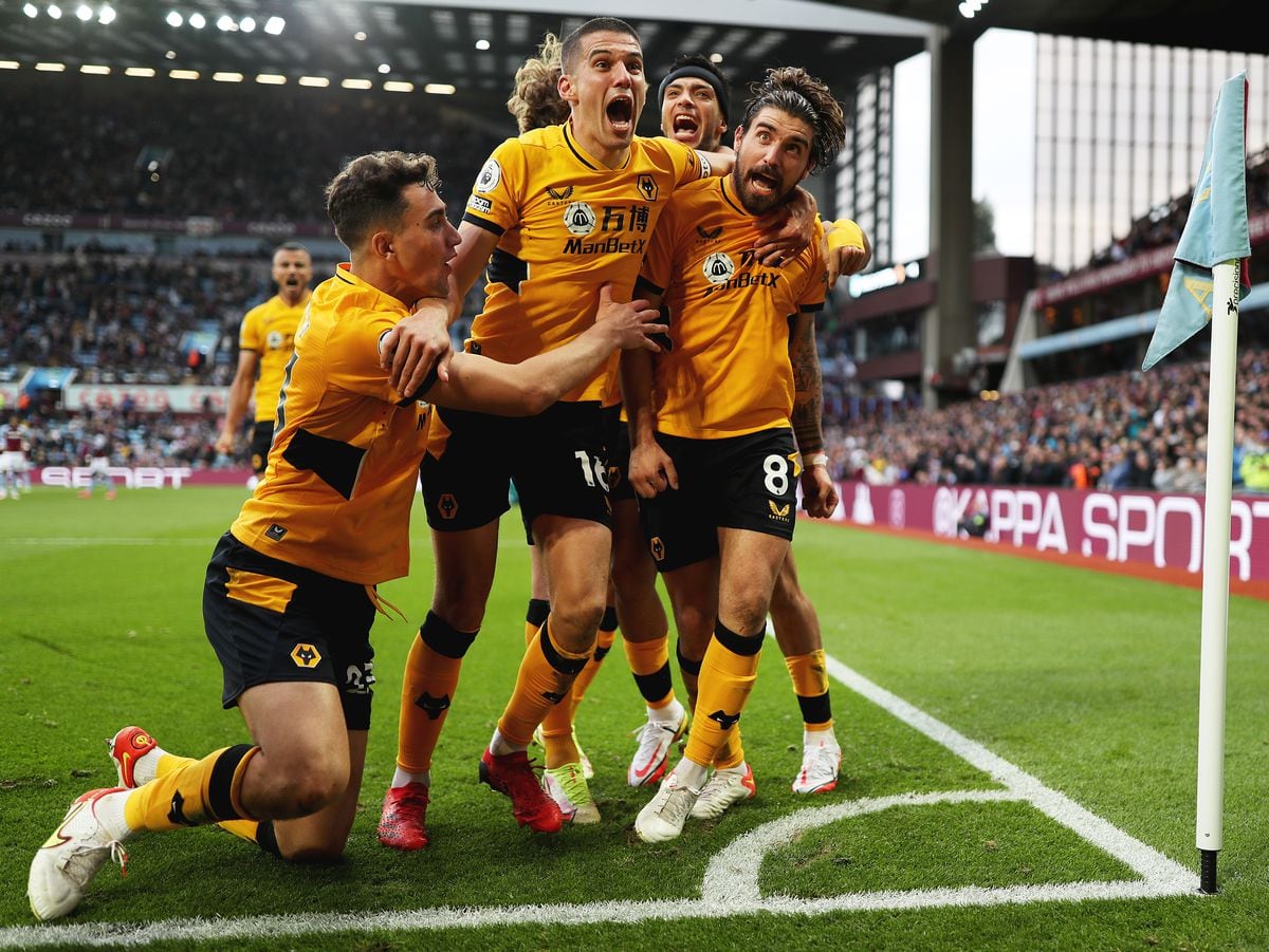 Ruben Neves of Wolverhampton Wanderers celebrates with teammates after scoring his team's third goal (Photo by Jack Thomas - WWFC/Wolves via Getty Images).