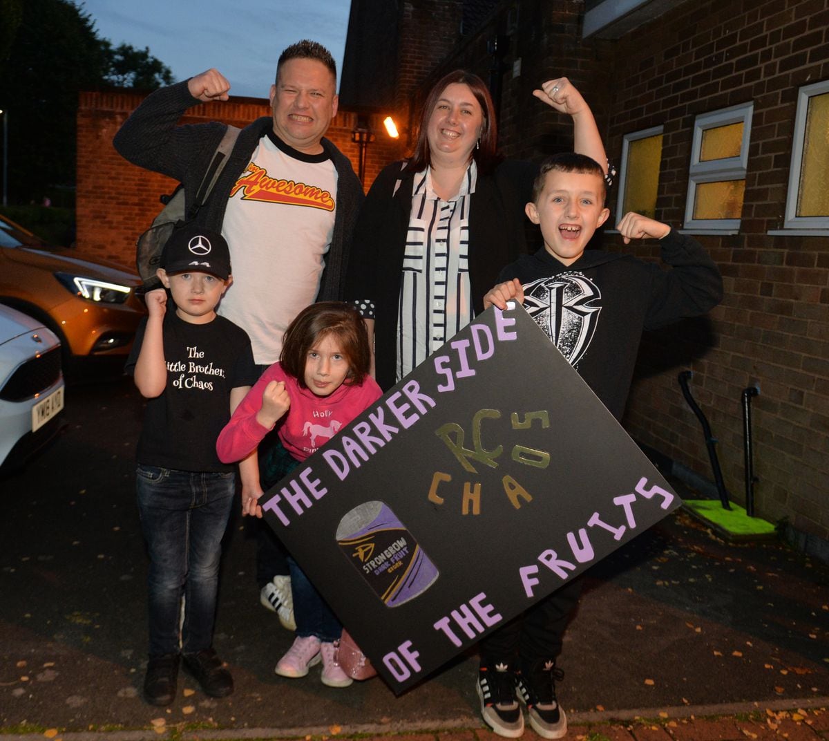 Tom Korbely and Sarah Korbely, of Oxley, with children (left-right) Joshua, five, Holly, eight, and Riley, nine, look forward to the night of action