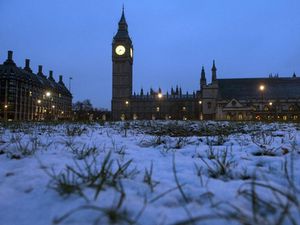 Snow outside the Houses of Parliament in London (Anthony Devlin/PA)