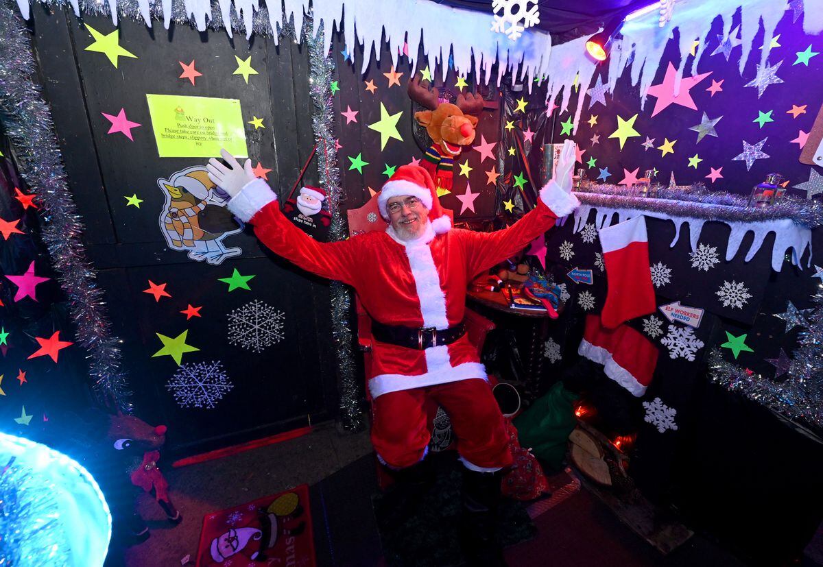 Nick dressed as Santa in his grotto 