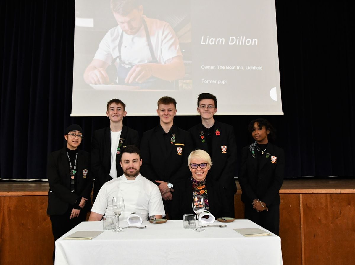Liam Dillon, owner of The Boat Inn at Lichfield, and headmistress of King Edward VI School Lichfield Jane Rutherford with sixth-form senior prefects at the school