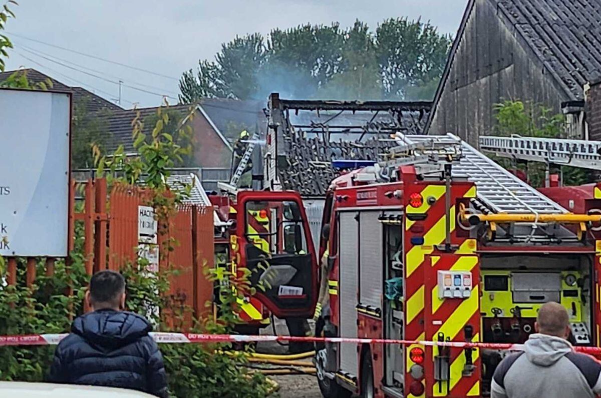 Fire crews at the scene of the blaze in Wharf Mews, Netherton. Photo: Ria Butcher