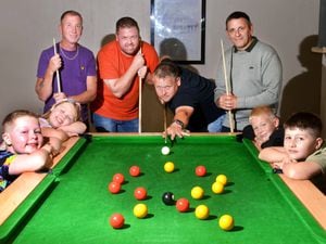 At the back, from left, are Martin Cook, Tony Cooper, Emma's husband Keith Unitt and Craig Longo. The children are Charlie Cooper, 10, Daisy Cooper, seven, Joshua Cook, nine and Emma's nine-year-old son Harry Unitt. The Lupus logo is formed in balls on the table