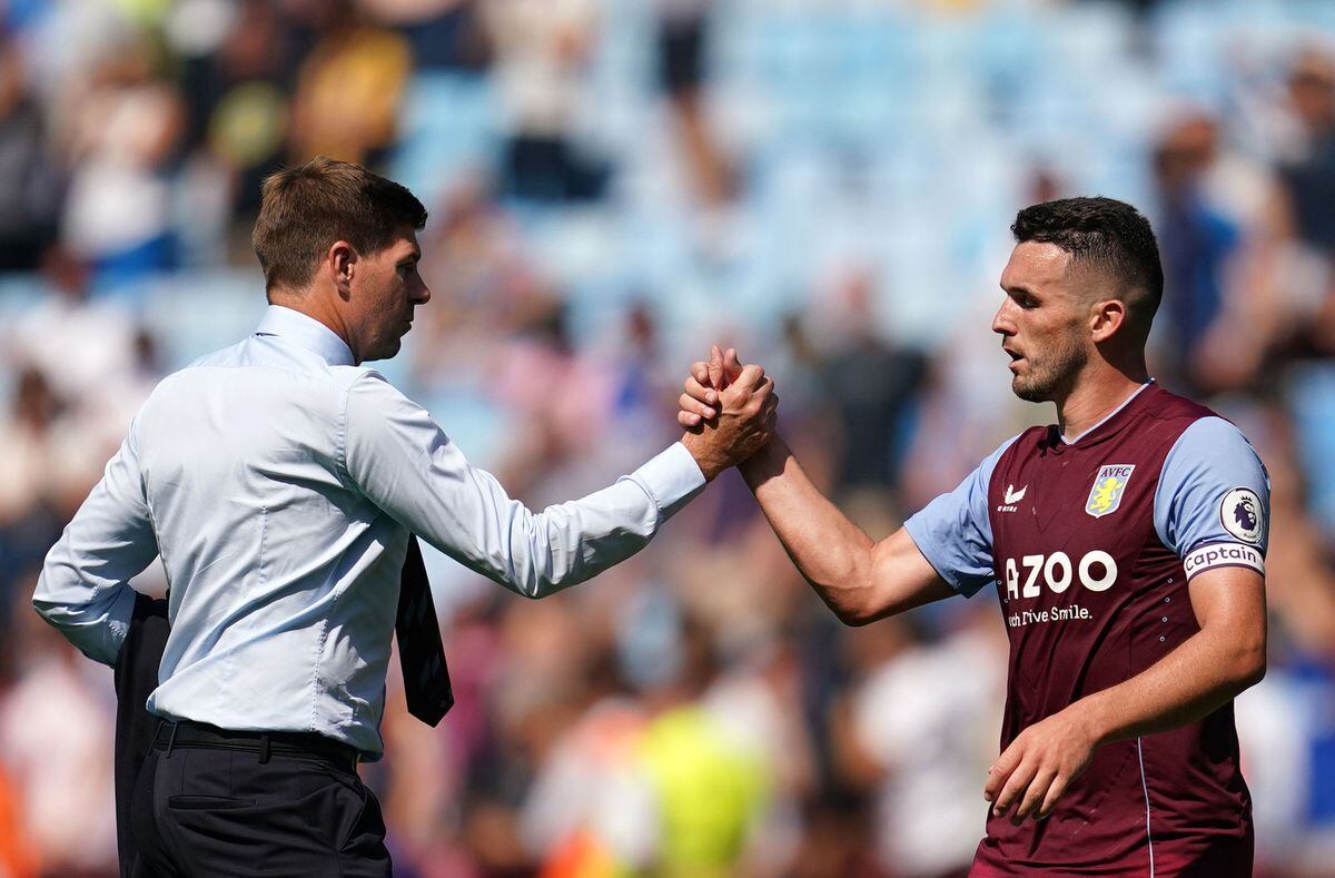               Aston Villa manager Steven Gerrard greets John McGinn