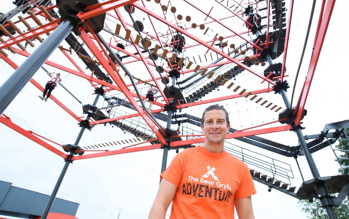 Bear Grylls stands at the foot of the highwire