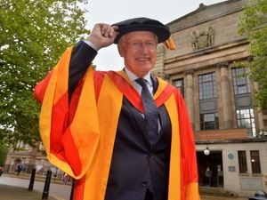 Tipping his cap: Bob Warman received an honorary degree from the University of Wolverhampton on Thursday.