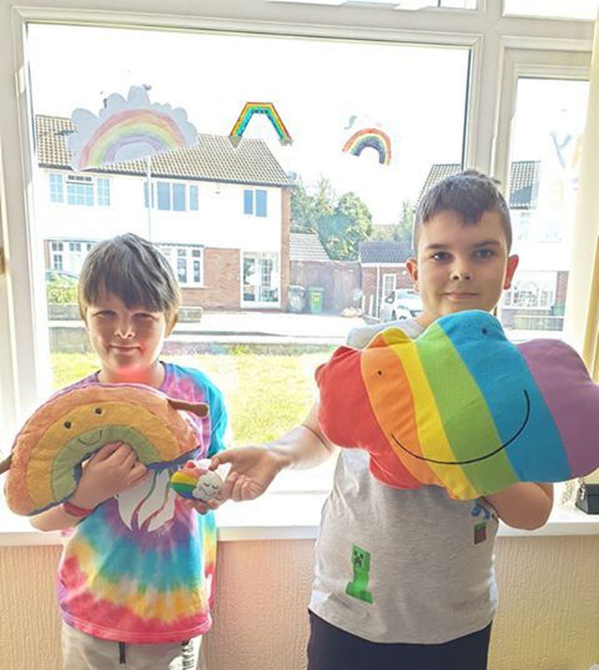 Archie, 8, and Stanley Conlon, 9, with their rainbows. Fordhouses, Wolverhampton