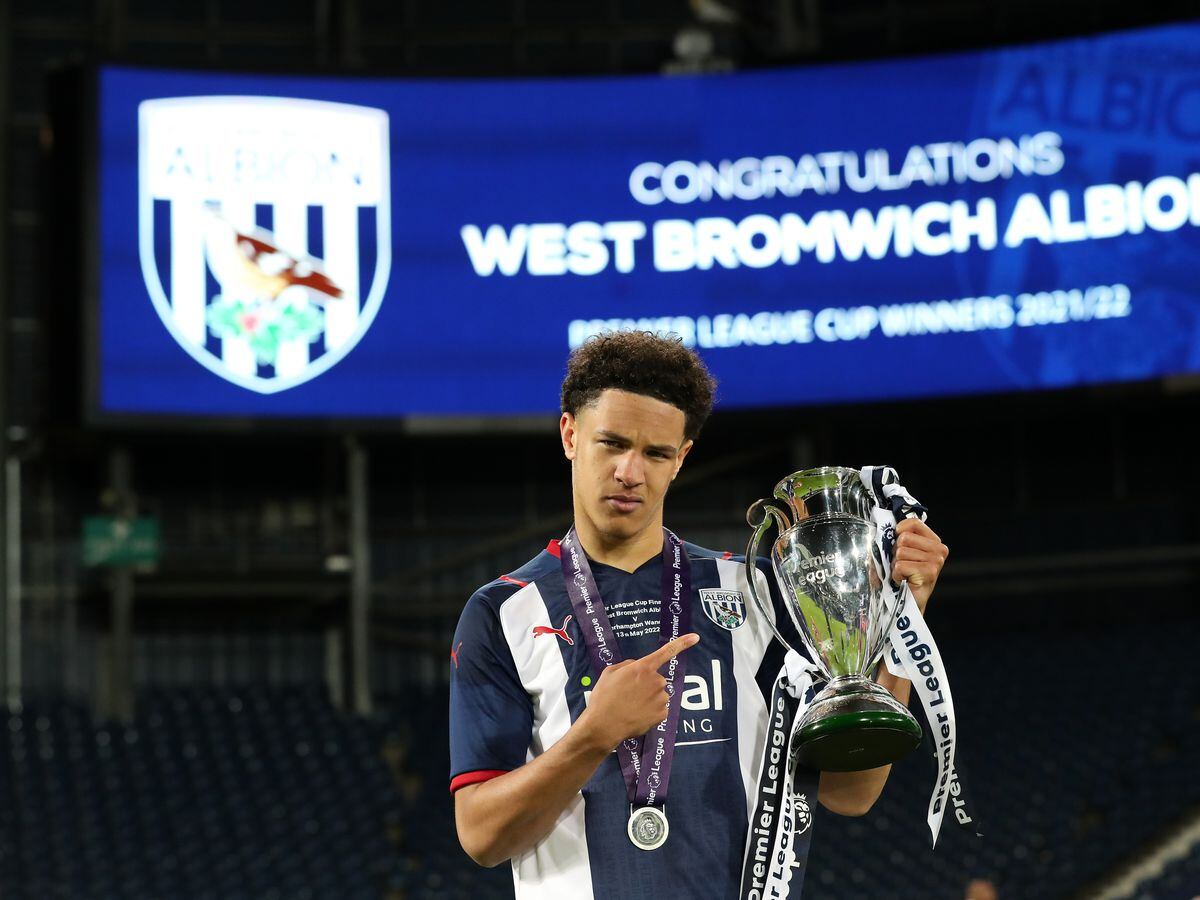 Ethan Ingram of West Bromwich Albion with the Premier League Cup trophy after the West Bromwich Albion U23 v Wolverhampton Wanderers U23: Premier League Cup Final at The Hawthorns on May 13, 2022 in West Bromwich, England. (Photo by Adam Fradgley/West Bromwich Albion FC via Getty Images).