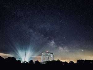 Shooting stars and the Milky Way are seen over the Lovell Telescope at Jodrell Bank Observatory in Cheshire. Photo: Peter Byrne/PA Wire