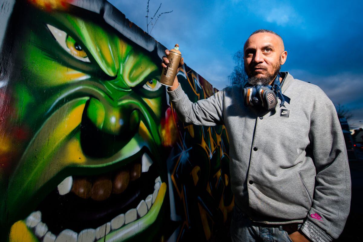 Graffiti Artist Lee Smith with his latest work