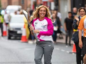 Strictly Come Dancing star Amy Dowden dances the streets of Dudley with the Queen's Baton.