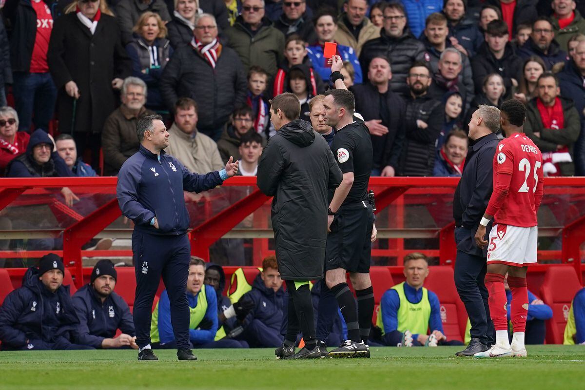 Nottingham Forest assistant manager Alan Tate is shown a red card by referee Chris Kavanagh. Picture: Nick Potts/PA Wire.