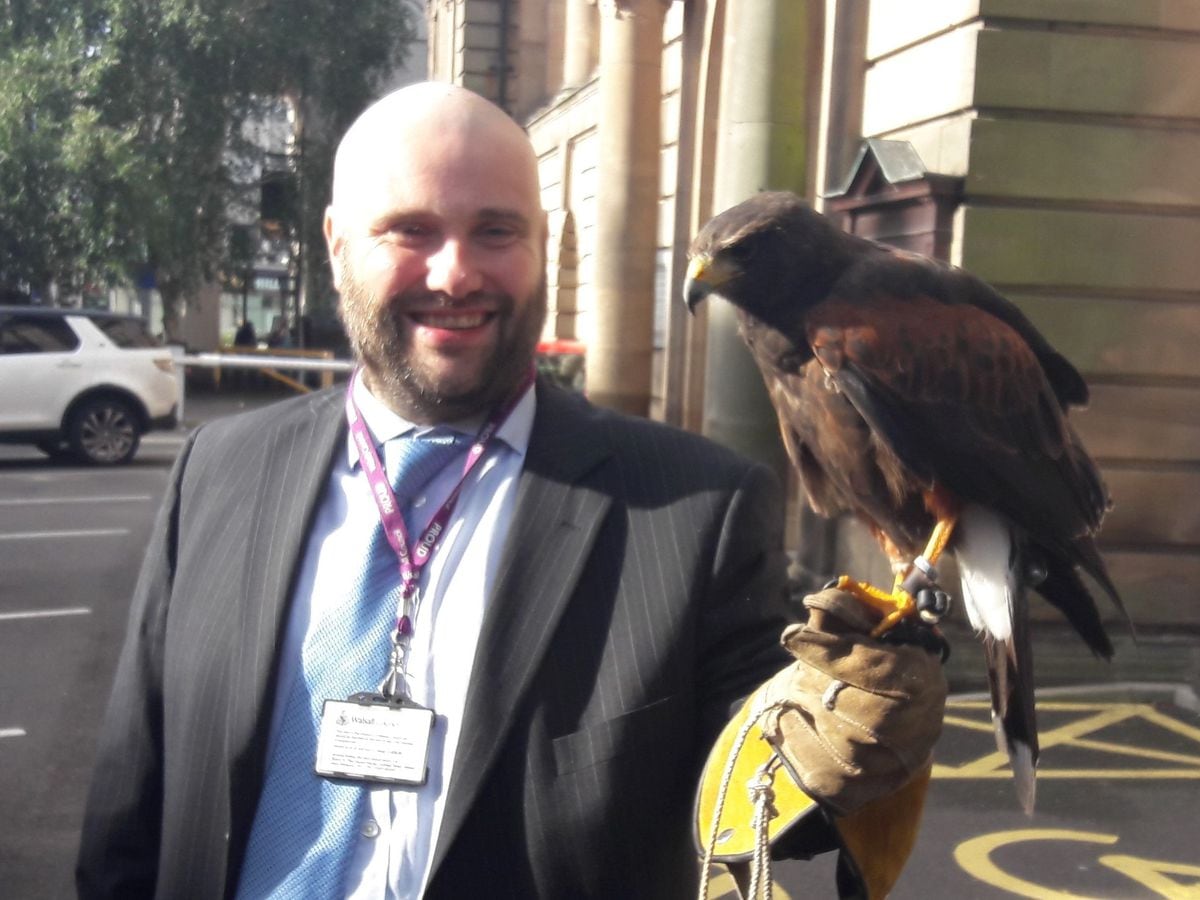 Councillor Oliver Butler with Boris the hawk