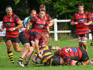 Stafford, in red, try to wrestle the ball away from Telford Hornets during Saturday afternoon’s victory in Shropshire