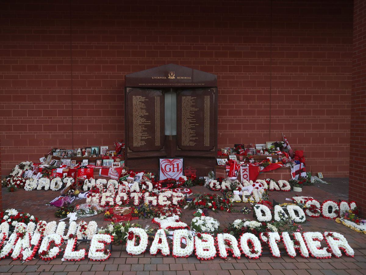 A general view of floral tributes at the Hillsborough Memorial at Anfield Stadium