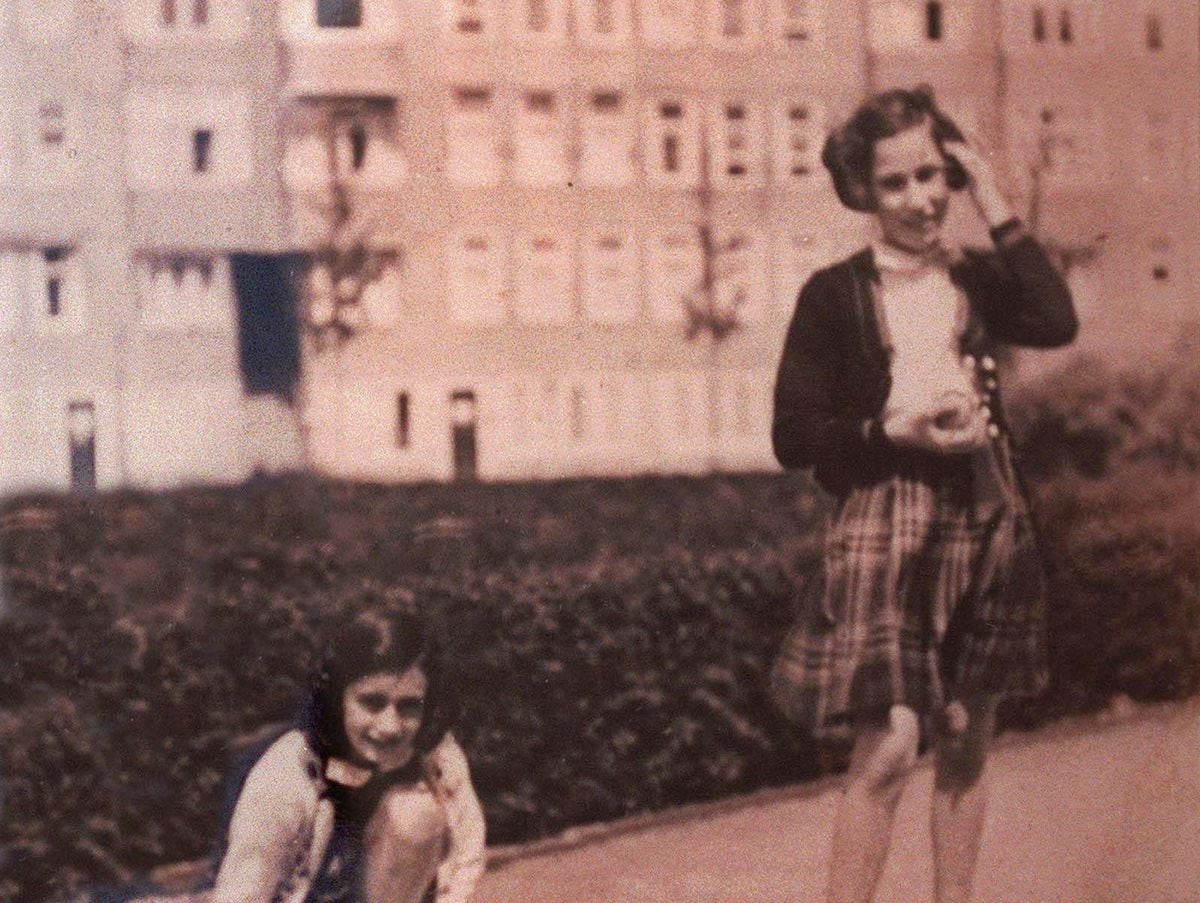 Anne Frank and childhood friend Hannah Goslar Pick, right, are seen in this undated photo from pre-World War Two in Amsterdam during a game of hopscotch