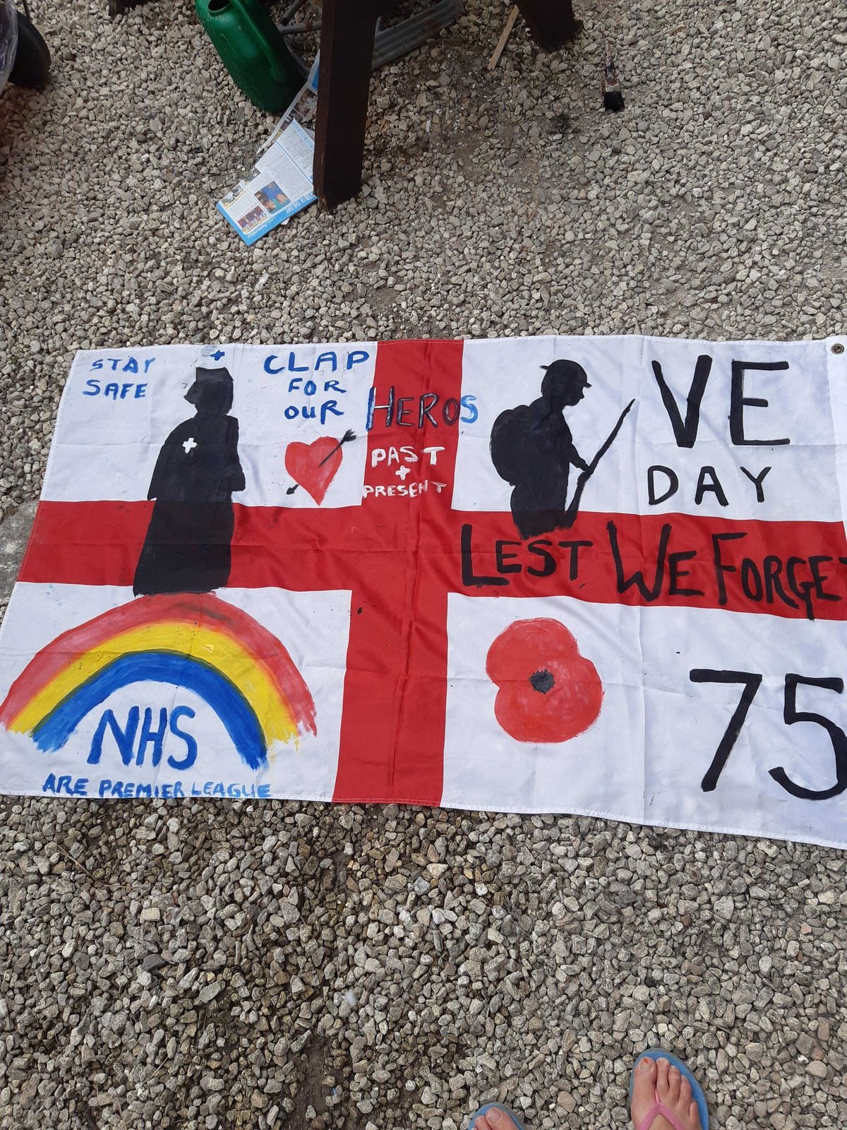 Sharon Moore painted this flag to hang outside her house in Bilston