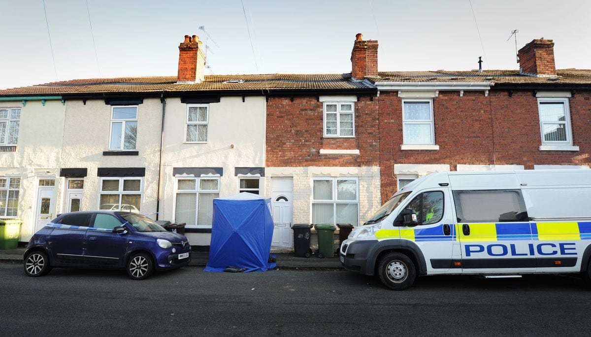 Police remained at the scene in James Street yesterday as the murder inquiry gathered pace