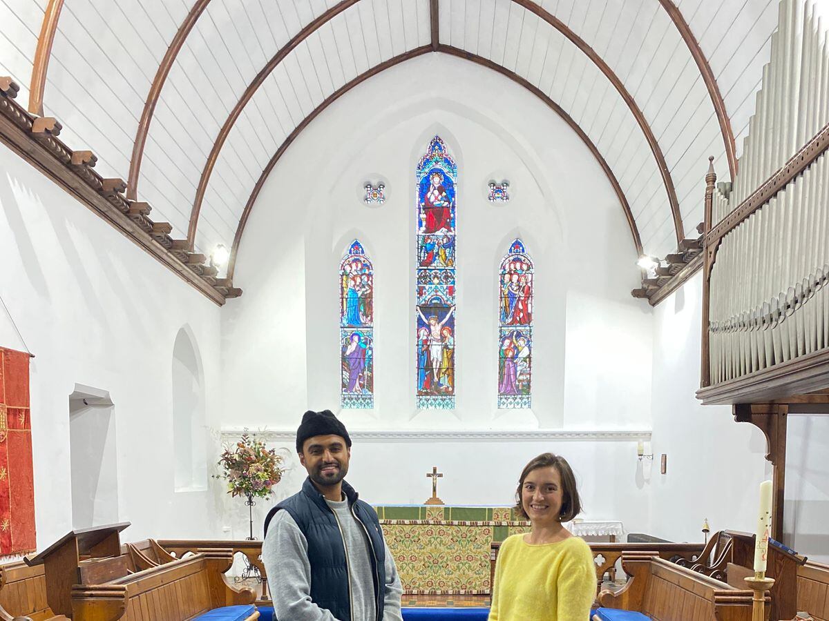 Sabah Ahmedi, who is one of Britain's youngest Imams, with Charlotte Mathias, treasurer at All Saints Church in Tilford, Surrey.