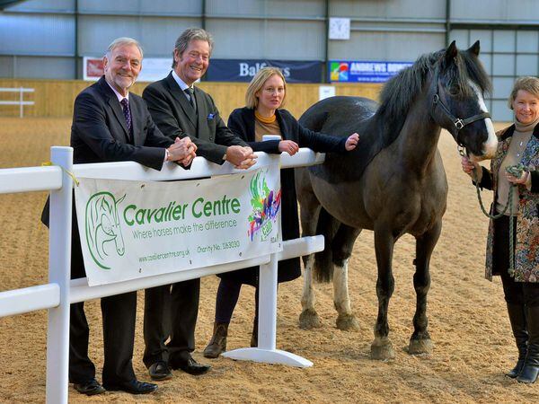 Celebrating the £10,000 grant to the Cavalier Centre is chairman Selina Graham, pictured with Sion the horse, and manager Rachel Lambert-Jones (behind the fence) with Dave Kettle, chairman of Shropshire Masonic Charity Association and Roger Pemberton (Leader of Shropshire Freemasons Provincial)..