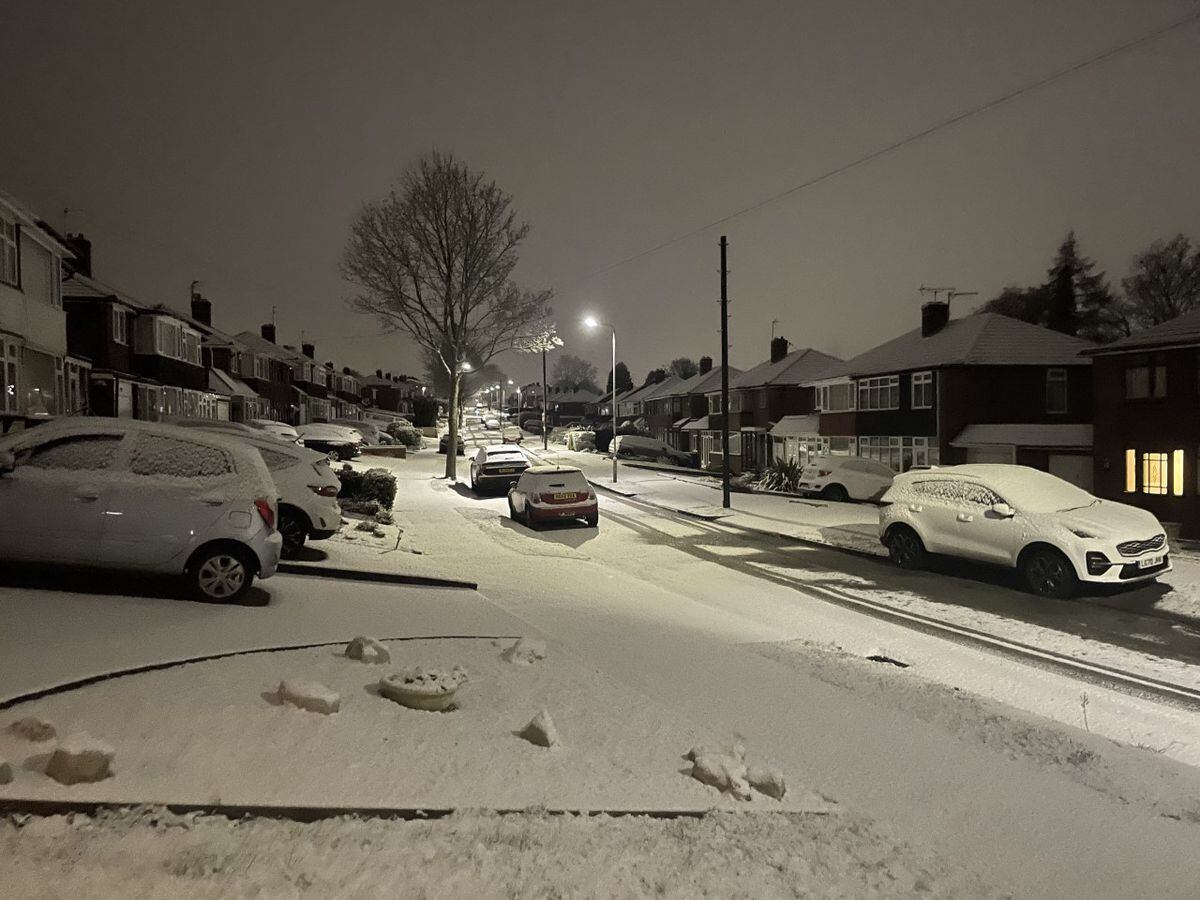 A snow-covered Grosvenor Road in Ettinghsall Park, Wolverhampton this morning