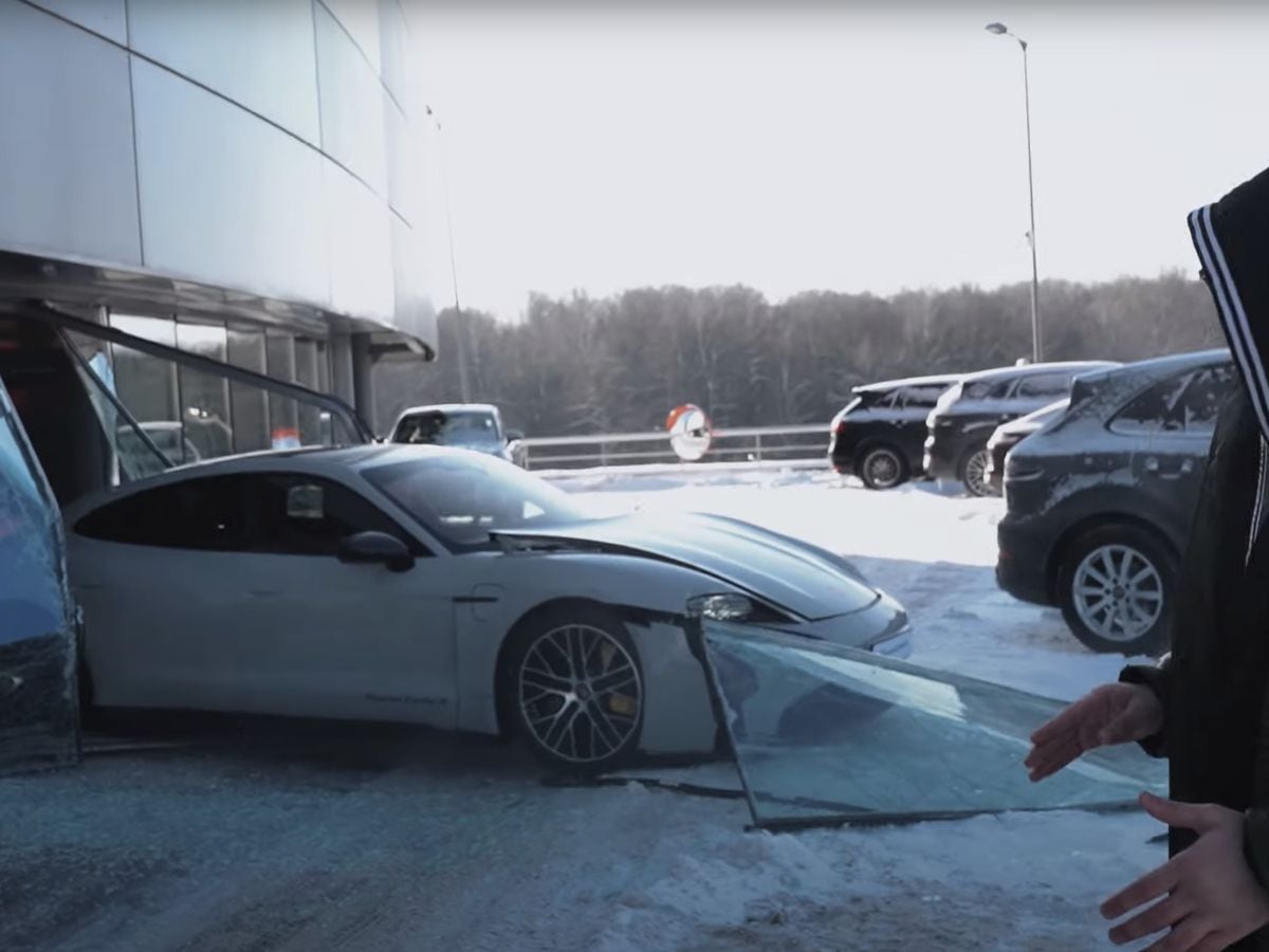 Russian Youtuber Crashes Porsche Taycan Through Dealership Window | Express & Star