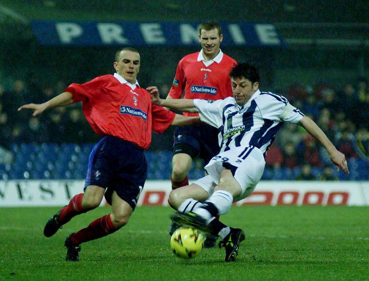 Andy Townsend in action for Albion against Swindon Town in the 1990s