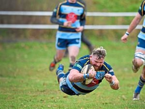 Ben Rhodes dives over for a try during Dudley Kingswinford’s 21-7 victory over Paviors in the Midlands Premier