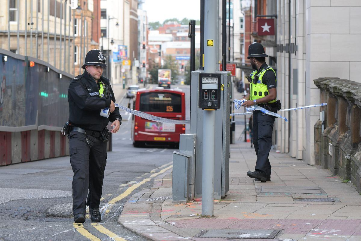 Police officers cordon off Colmore Row. Photo: SnapperSK