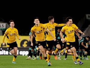 Wolves celebrate shoot-out win (Photo by Jack Thomas - WWFC/Wolves via Getty Images)