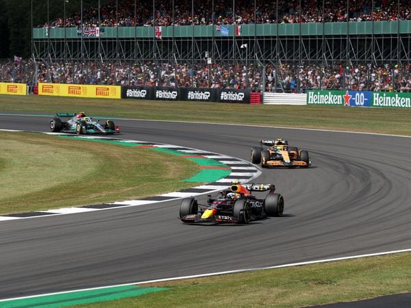 Red Bull’s Sergio Perez leading McLaren’s Lando Norris and Mercedes Lewis Hamilton during the British Grand Prix 2022 at Silverstone, Towcester