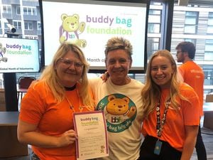 Volunteer, and member of Amazon’s Community Engagement Team, Jo Wilkinson-Hughes, founder Karen Williams OBE, and volunteer Ellie Sanderson at a bag pack.