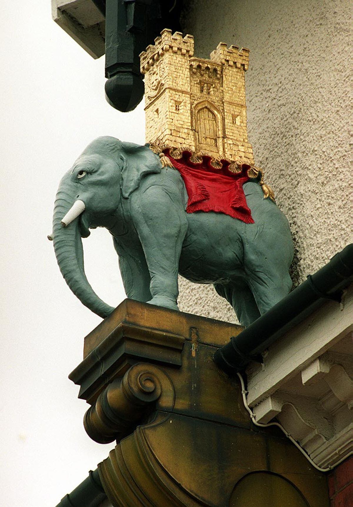 The elephant with a castle on its back that stood overlooking the junction from the wall of the pub