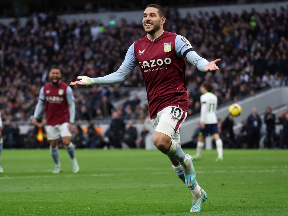 Aston Villa's Emiliano Buendia celebrates after scoring his side's opening goal during the English Premier League soccer match between Tottenham Hotspur and Aston Villa
