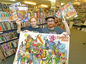 Kyle Wright and Alex Bowden celebrate in 2019 after Forbidden Planet in Victoria Street, Wolverhampton was nominated for best comic shop in the UK by magazine Comic Scene