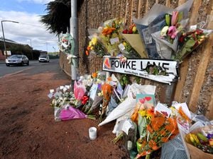 Tributes have been left at the scene of the fatal crash.