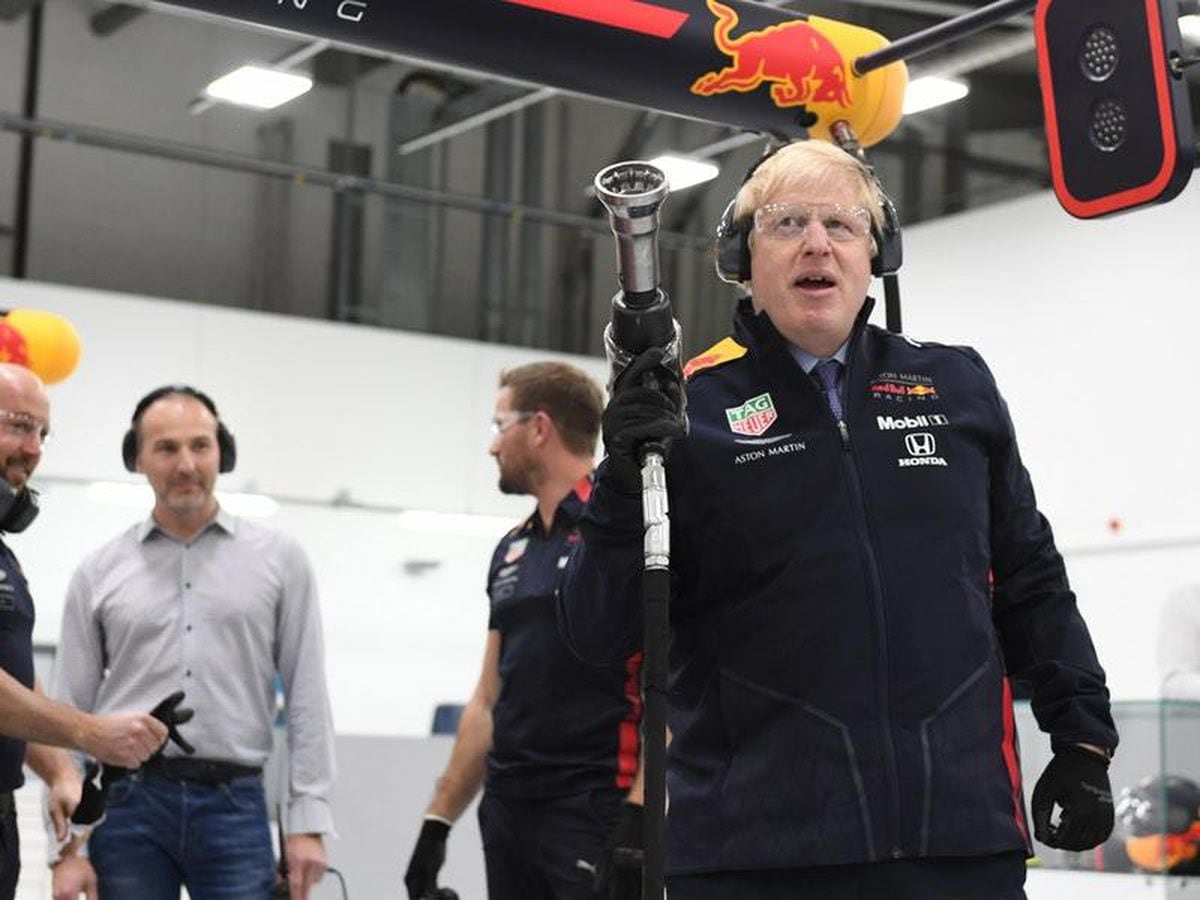 Boris Johnson visits Red Bull Racing while election campaigning in Milton Keynes (Stefan Rousseau/PA)
