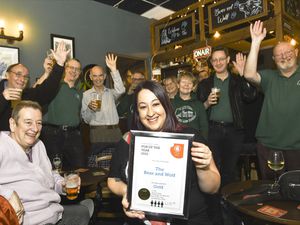 Alanah Jones at the Bear and Wolf, Kidderminster celebrating their Gold win with local CAMRA members. Photo: Colin Hill