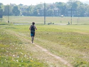 A runner on Blackheath, in south London, which is the start of the course for the London Marathon