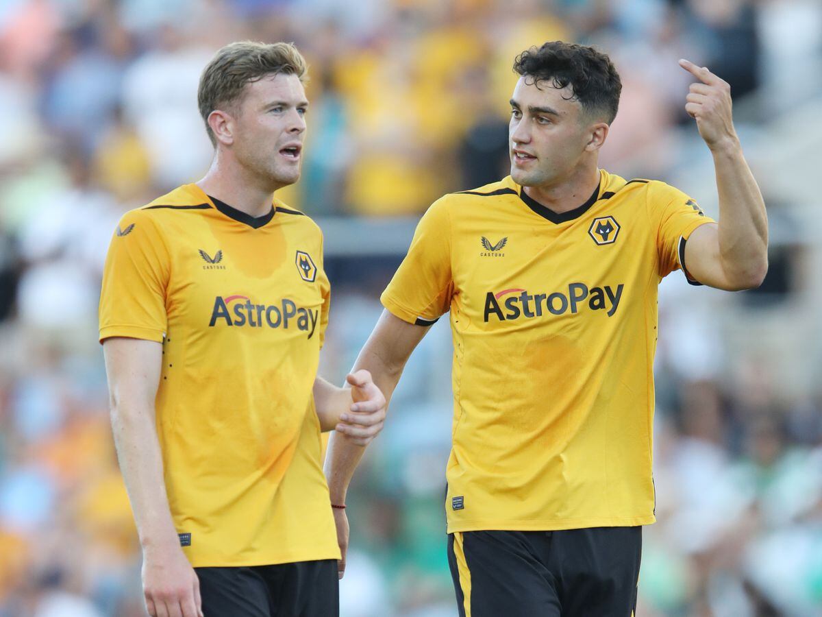 Max Kilman of Wolverhampton Wanderers speaks with Nathan Collins during the pre-season match between Wolverhampton Wanderers and Sporting CP at Estadio Algarve on July 30, 2022 in Faro, Portugal. (Photo by Jack Thomas - WWFC/undefined).