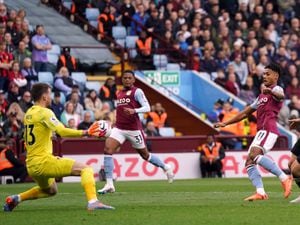 Bournemouth goalkeeper Neto saves a shot from Aston Villa's Ollie Watkins 